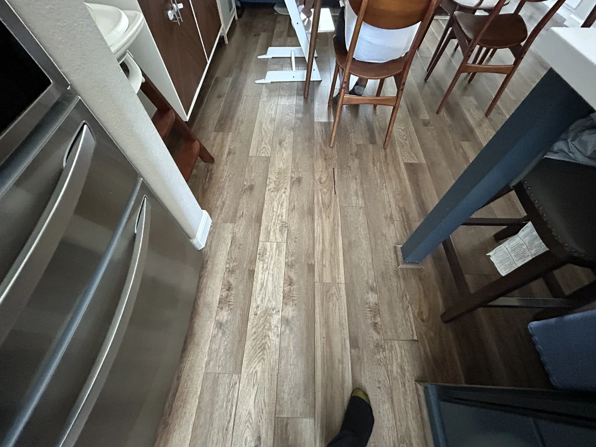 Standing view of the rigid-core flooring near the kitchen and dining area