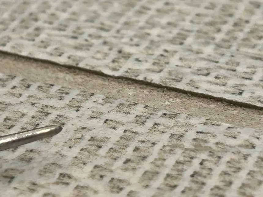 Visible elevation difference at adjacent tile edges