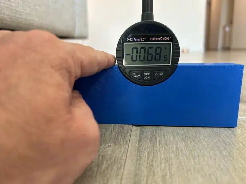 Wood-look tile installation with visible adjacent-edge lippage